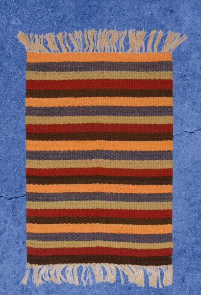 Handwoven Mood Rug™. Earth Tones on One Side (Rust, Salmon, Gray, Brown, Sage), Bright Colors on One Side (Turquoise, Red, Yellow Gold)