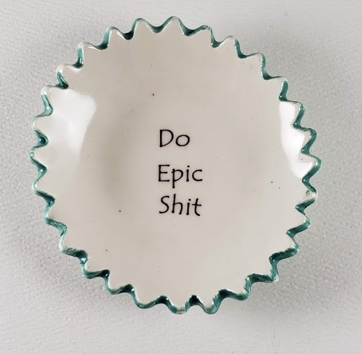 Tiny plate with "Do Epic Shit" picture