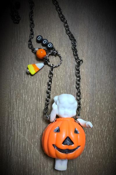 Pumpkin vintage doll necklace