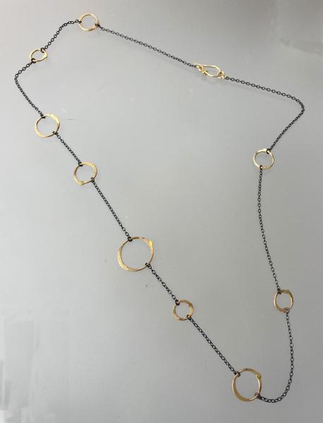 Long Oxidized Silver/floating gold fill circle necklace