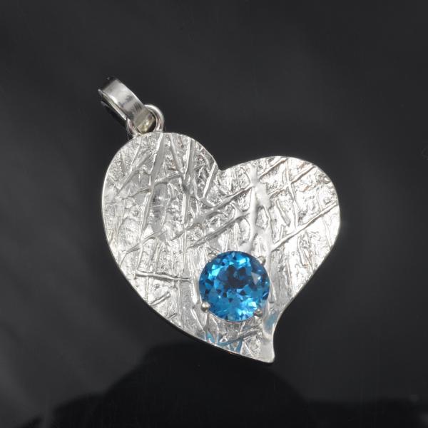 Sterling silver frost pattern heart with blue topaz gemstone picture