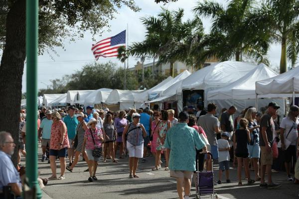 Crowds of shoppers enjoy the show