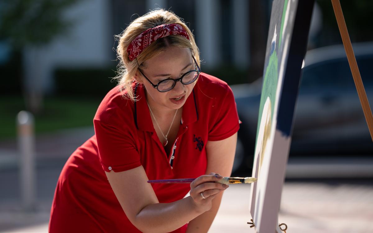 Dr. Chelsea Glidden Bosch, a central Florida native artist, who goes by c.glibo.