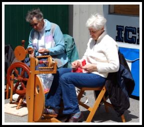 Spinners are all about the festival teaching and showing how yarn is made