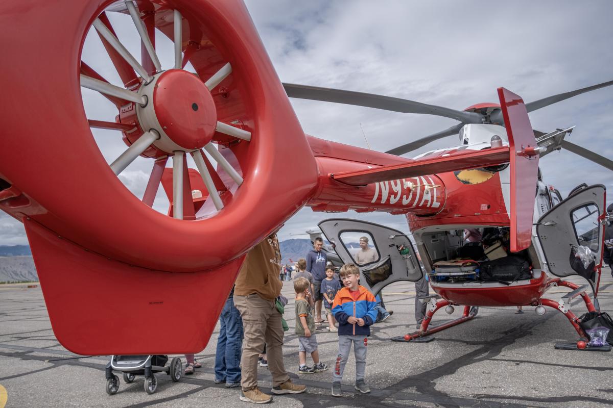 Red helicopter open for the community to go inside and look around.