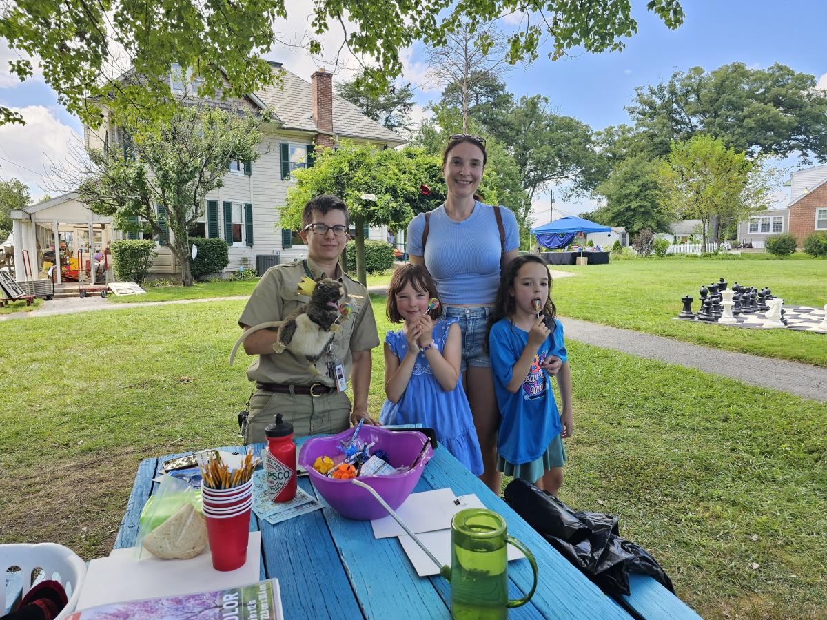 Holt Park Naturalist Mel Tilley with a happy family
