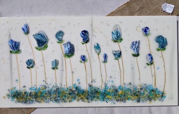 Blue/aqua flowers on painted stems picture