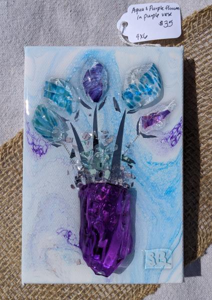 Flowers in purple vase picture
