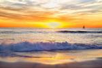 Sailboat gliding by Marine Street beach, La Jolla, California