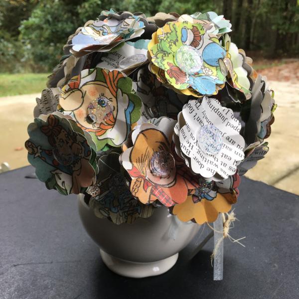 Raggedy Ann and the rainy day circus hand-cut paper flower arrangement in pitcher picture