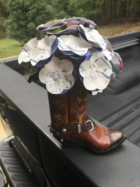 Music Sheet "Thank God I'm a Country Boy" hand-cut paper flower arrangement in Cowboy boot vase picture