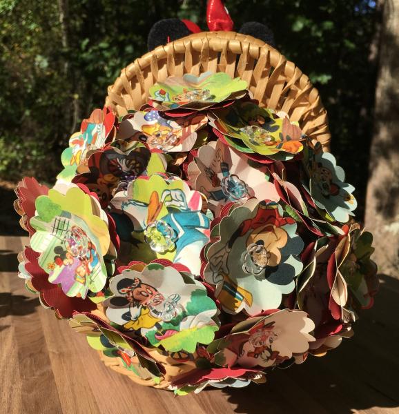 Mickey Mouse's picnic hand-cut paper flower arrangement in picnic basket, with small plush Minnie picture