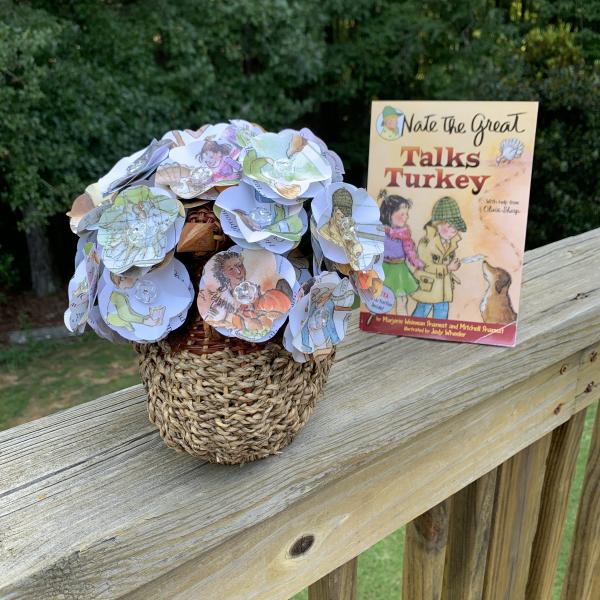 Nate the Great Talks Turkey hand-cut paper flower arrangement in wicker turkey. Price includes a journal of 50 blank sheets and some book pages. picture