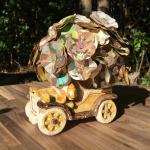 Chitty Chitty Bang Bang little golden book hand-cut paper flower arrangement in vintage mini car vase