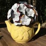 Music sheet Hedwig's theme hand-cut paper flower arrangement in Hufflepuff yellow teapot
