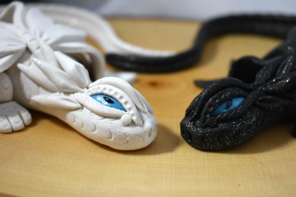 White and Black Clay Dragon Pair picture