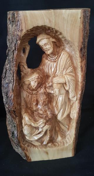 Detailed Hand Carved Holy Family inside Tree Branch picture