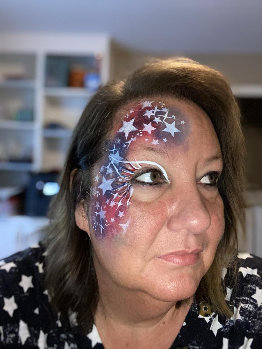 Color Craze face painting by Karen McDonough United