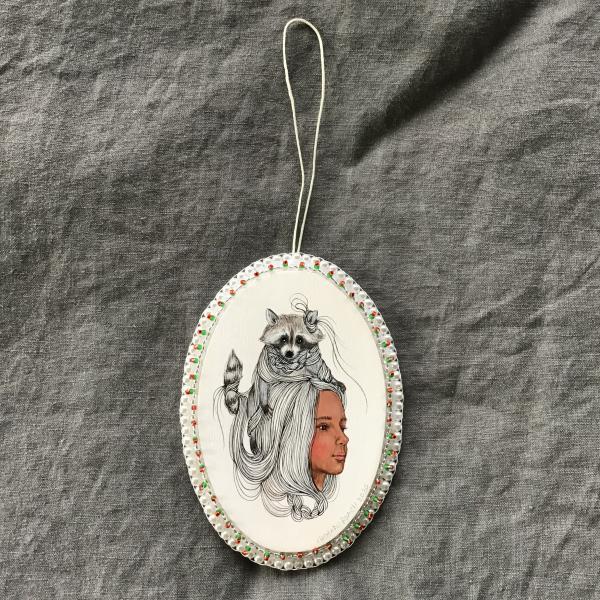 Tangled Hair Oval Raccoon Ornament picture