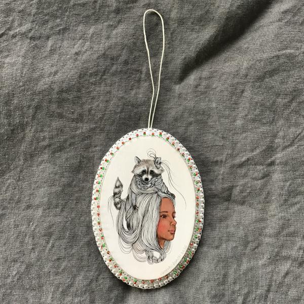 Tangled Hair Oval Raccoon Ornament