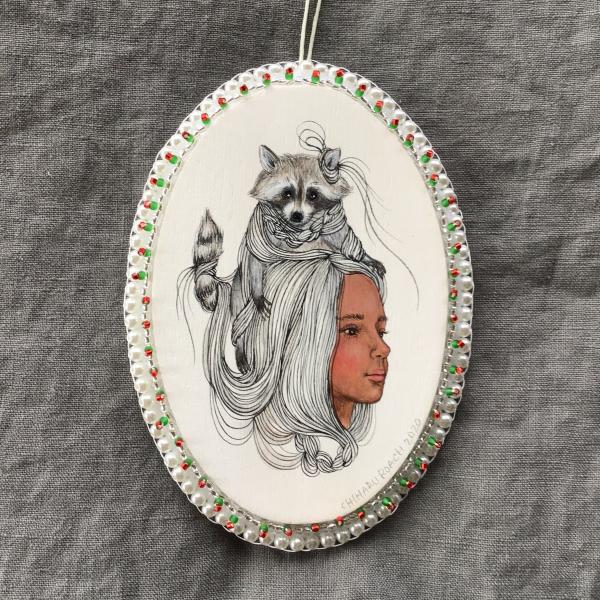 Tangled Hair Oval Raccoon Ornament picture