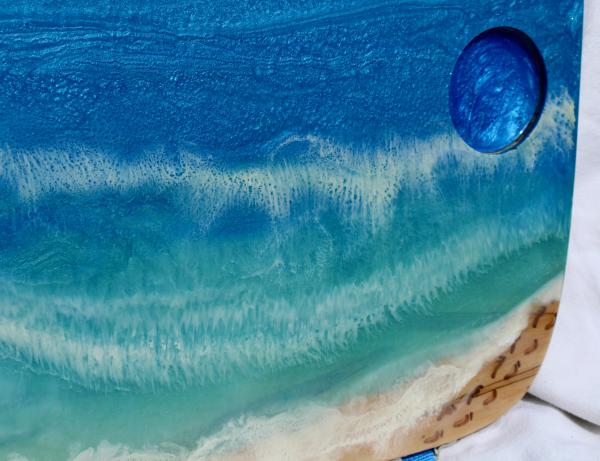 Ocean - footsteps disappearing along the beach picture