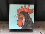 Rooster on light blue