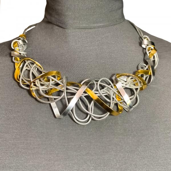 Flat Gold Silver Aluminum Swirl Necklace picture