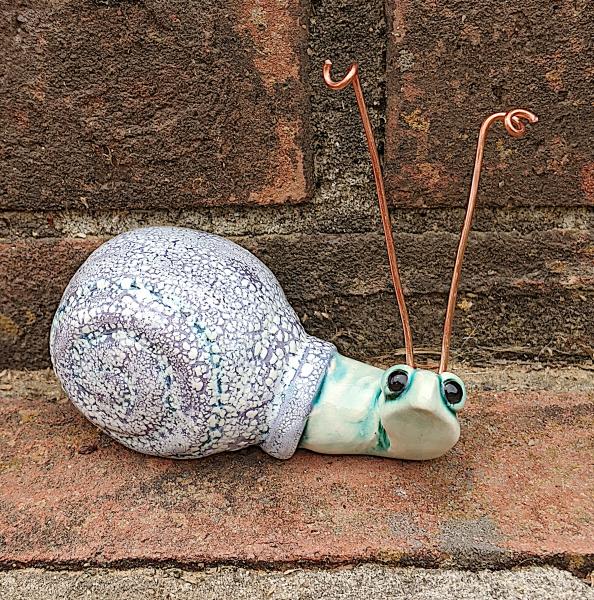 Whimsical Purple Snail with Copper Antennae