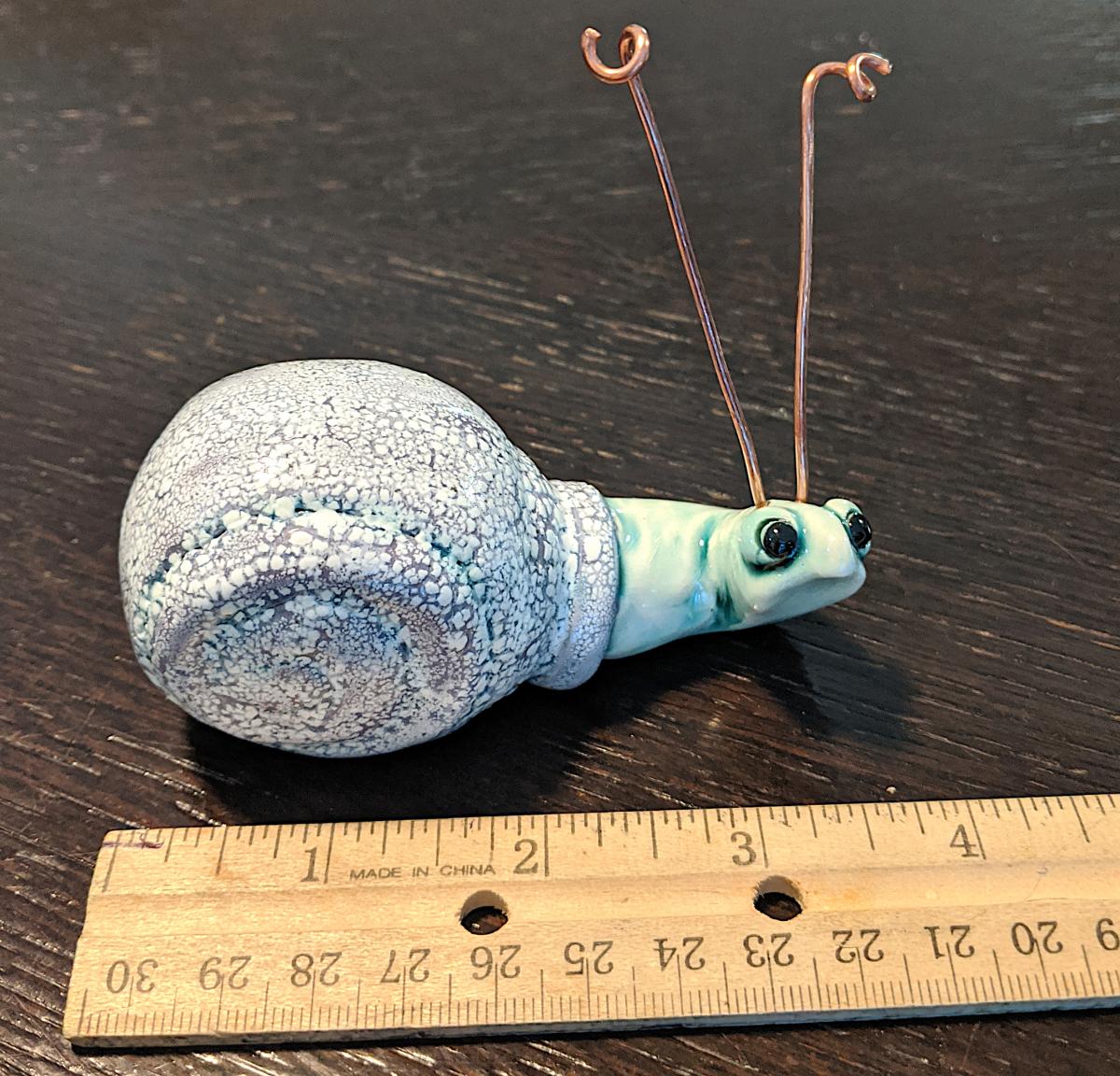 Whimsical Purple Snail with Copper Antennae picture