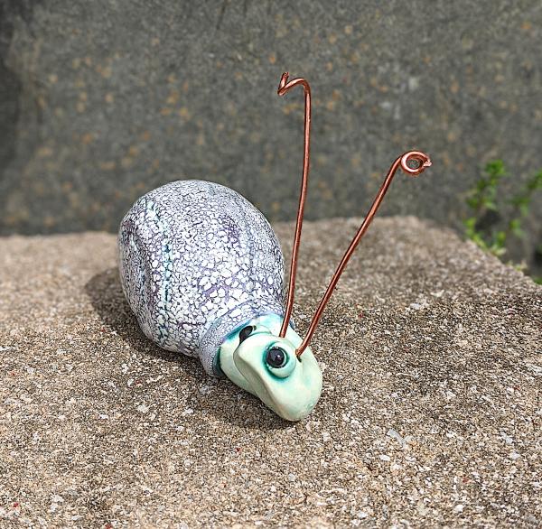 Whimsical Purple Snail with Copper Antennae picture