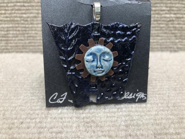 Face pendant w/ 18” cable wire included picture