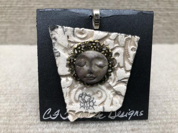 Face pendant w/ 18” cable wire included picture