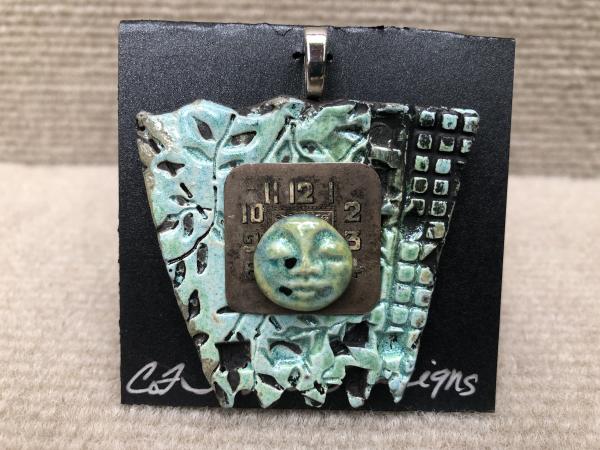 Face pendant w/ 18” cable wire included picture