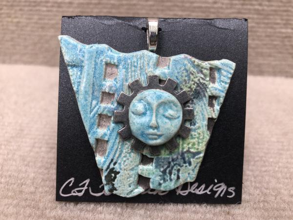 Face pendant w/ 18” cable wire included picture