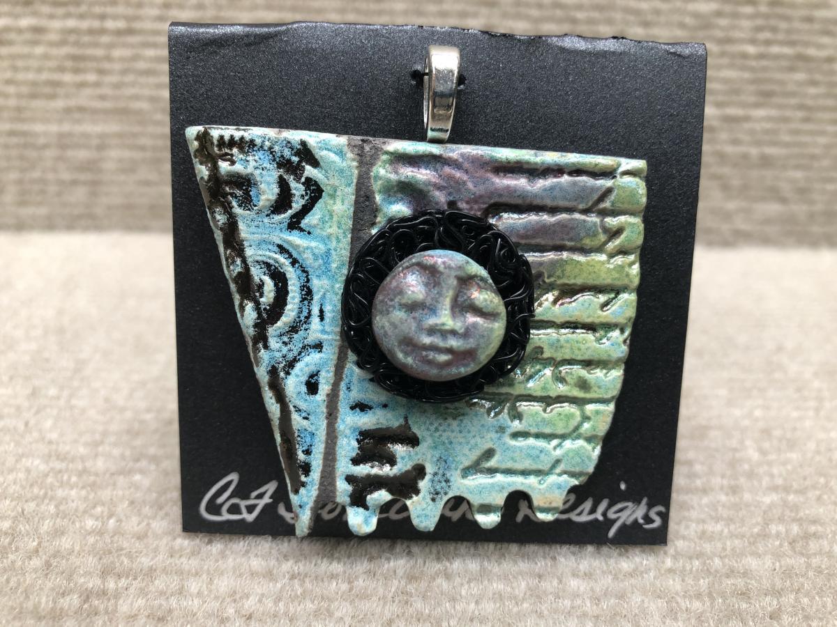 Face pendant w/ 18” cable wire included picture