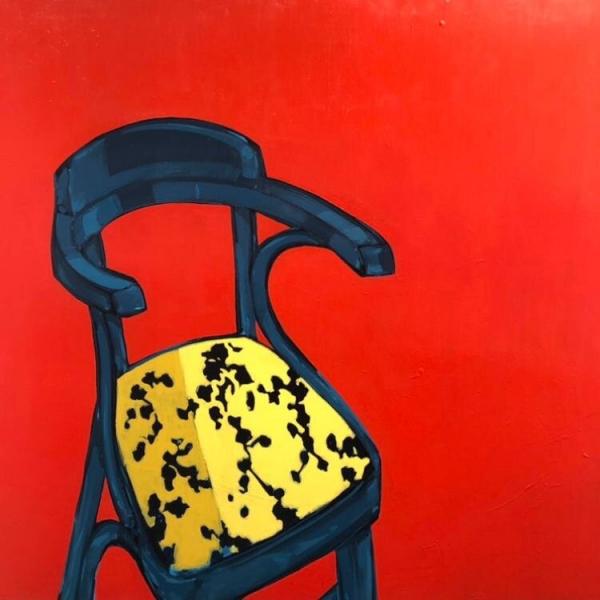 Blue Chair. Red Background. picture