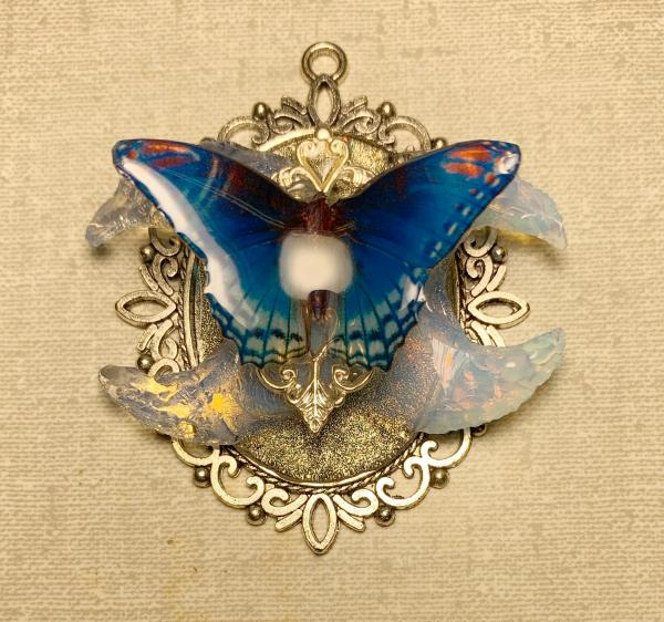 Bridal blue butterfly with opalite crescent moons pendant picture
