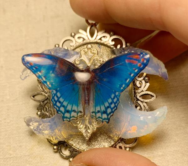 Bridal blue butterfly with opalite crescent moons pendant picture