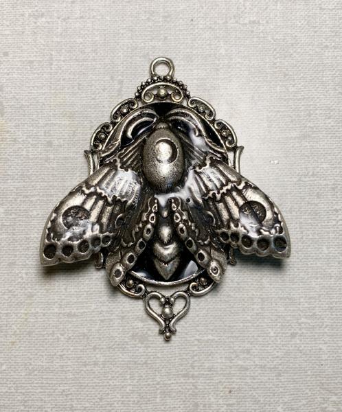 Metal Luna moth pendant picture