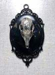 Metal skull pendant
