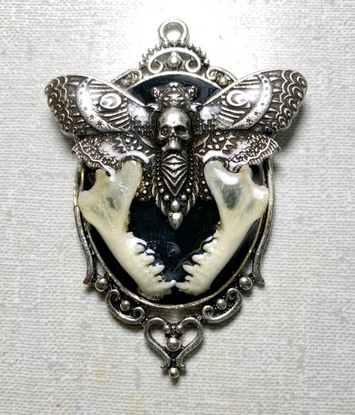 Metal deathshead moth and real bat jawbones pendant picture
