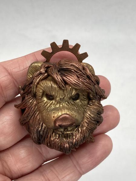 Lion sculpted pin and pendant