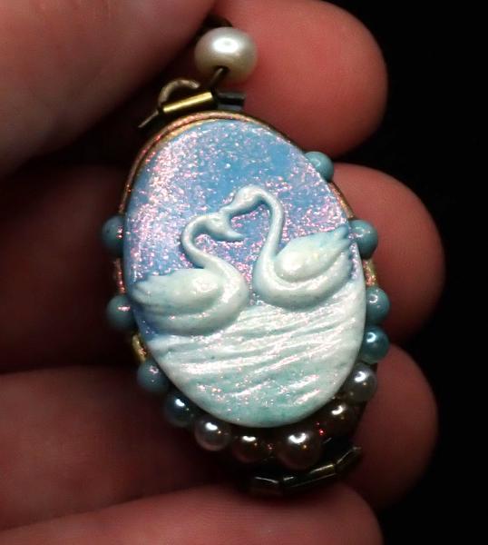 4-frame Swan Locket