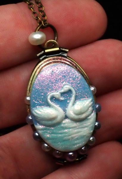 4-frame Swan Locket picture