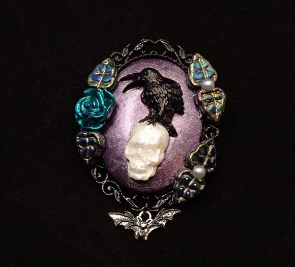 Haunted Mansion Homage Crow on a Skull Brooch picture