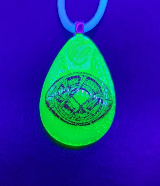 Uranium Glass Eye of Agamotto Pendant picture