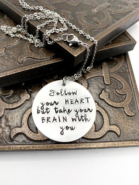 Follow your heart- take your brain necklace picture