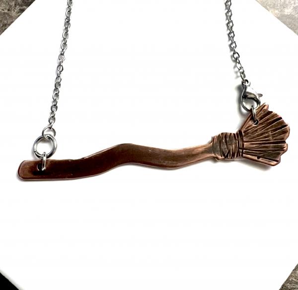 Copper witch broom necklace picture