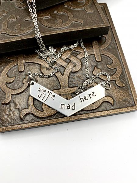 Alice in Wonderland We're all mad chevron necklace picture